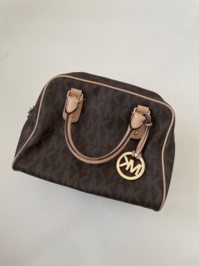 Michael Kors Grayson Barrel Leather Handbag in Brown